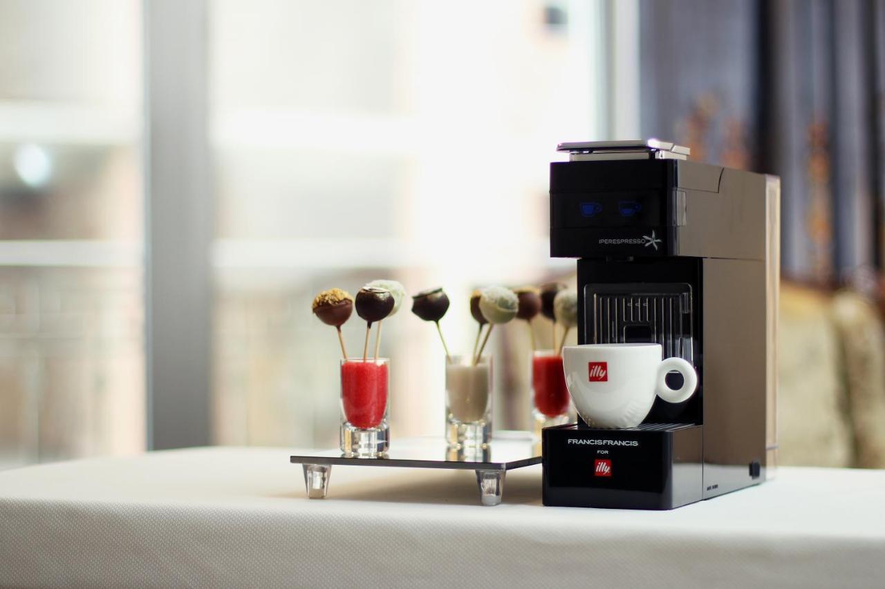 Orion Hotel 비슈케크 외부 사진 A Nespresso Vertuoline coffee machine